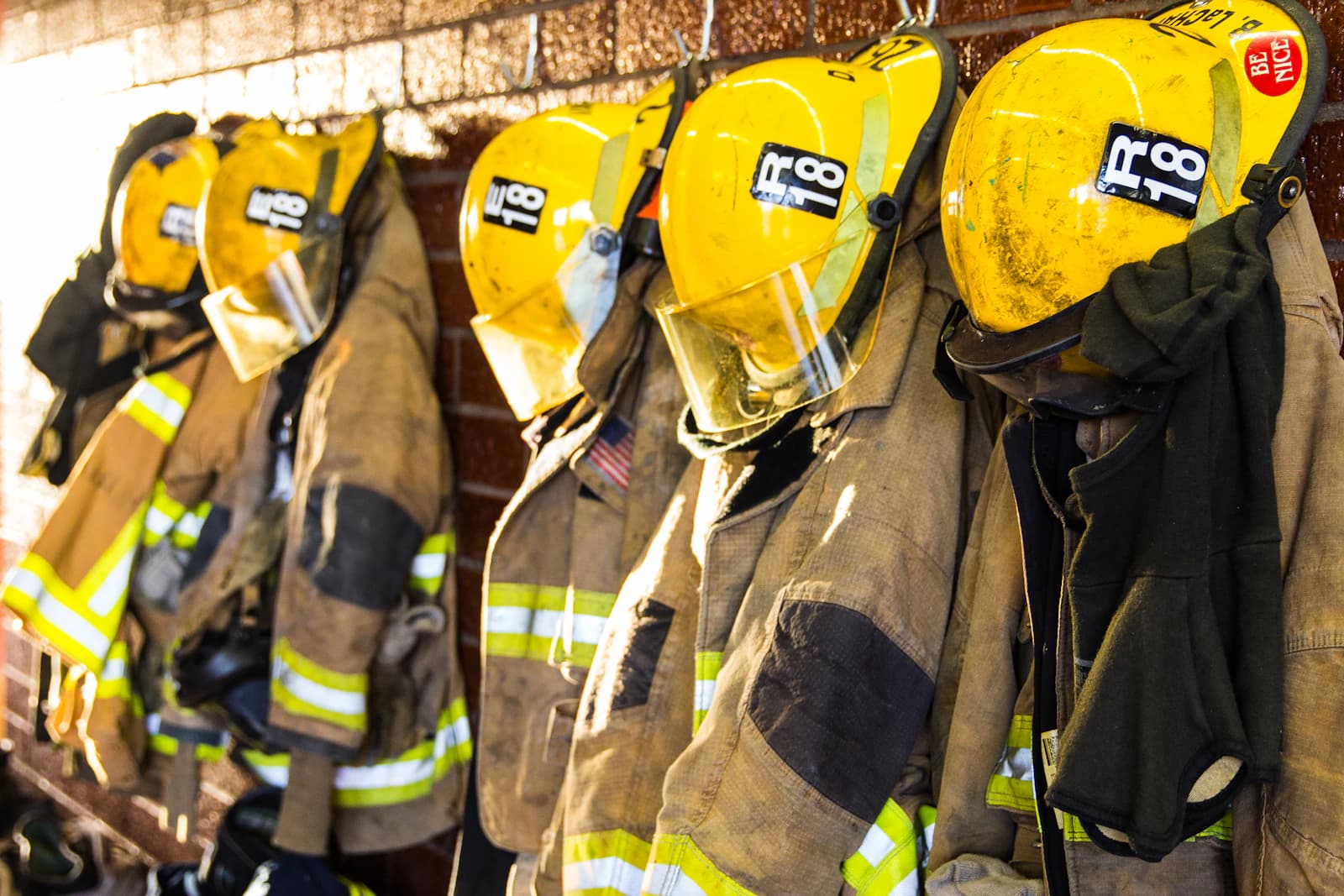 Turnout gear hanging ready on hooks in the station